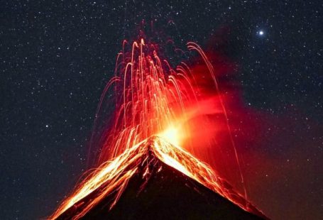 Volcanic Eruptions - Volcano Erupting at Night Under Starry Sky