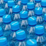 Plastic Recycling - A large group of blue water bottles