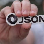 Object-Oriented Programming - Person Holding Logo of JSON